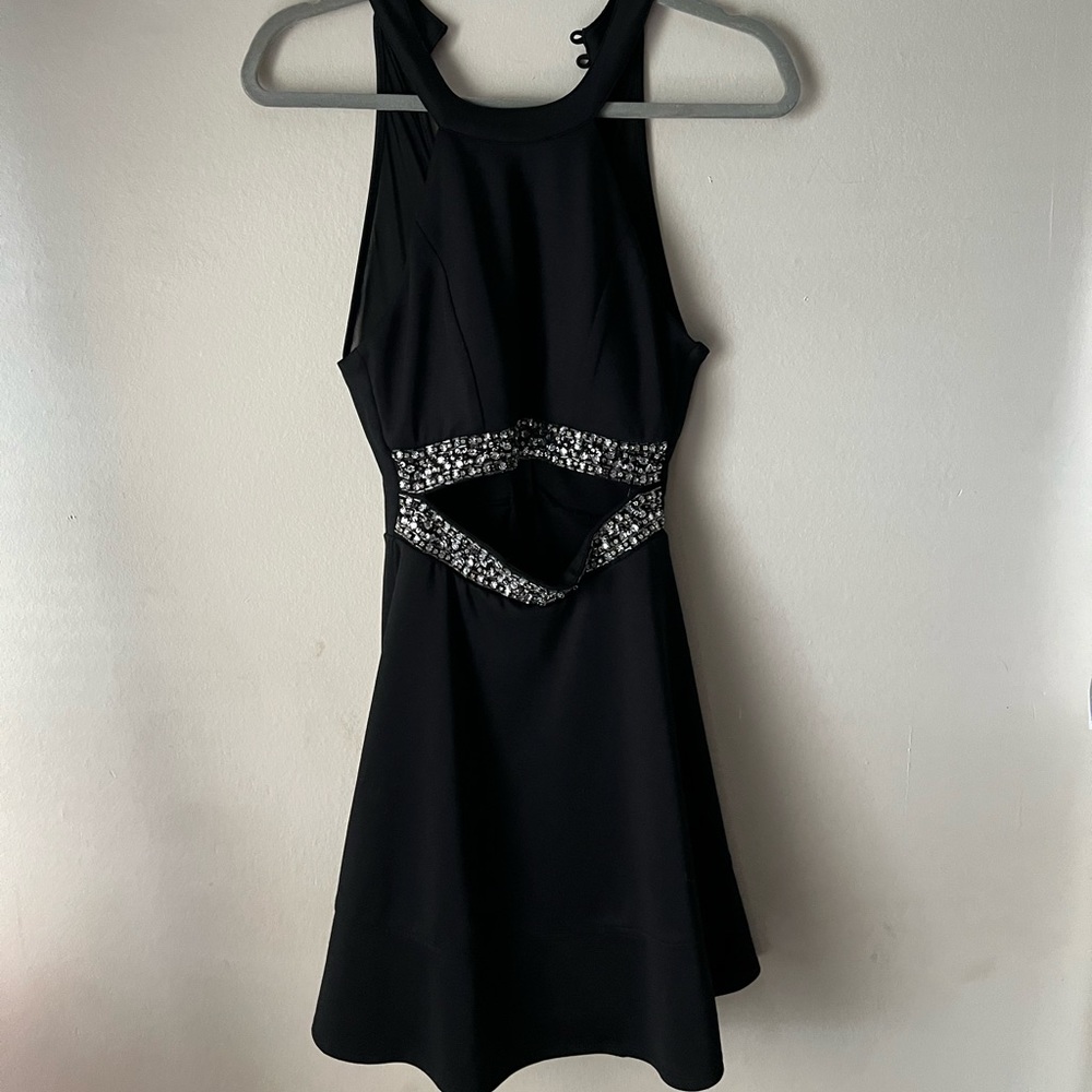 Black and sequin dress with open stomach